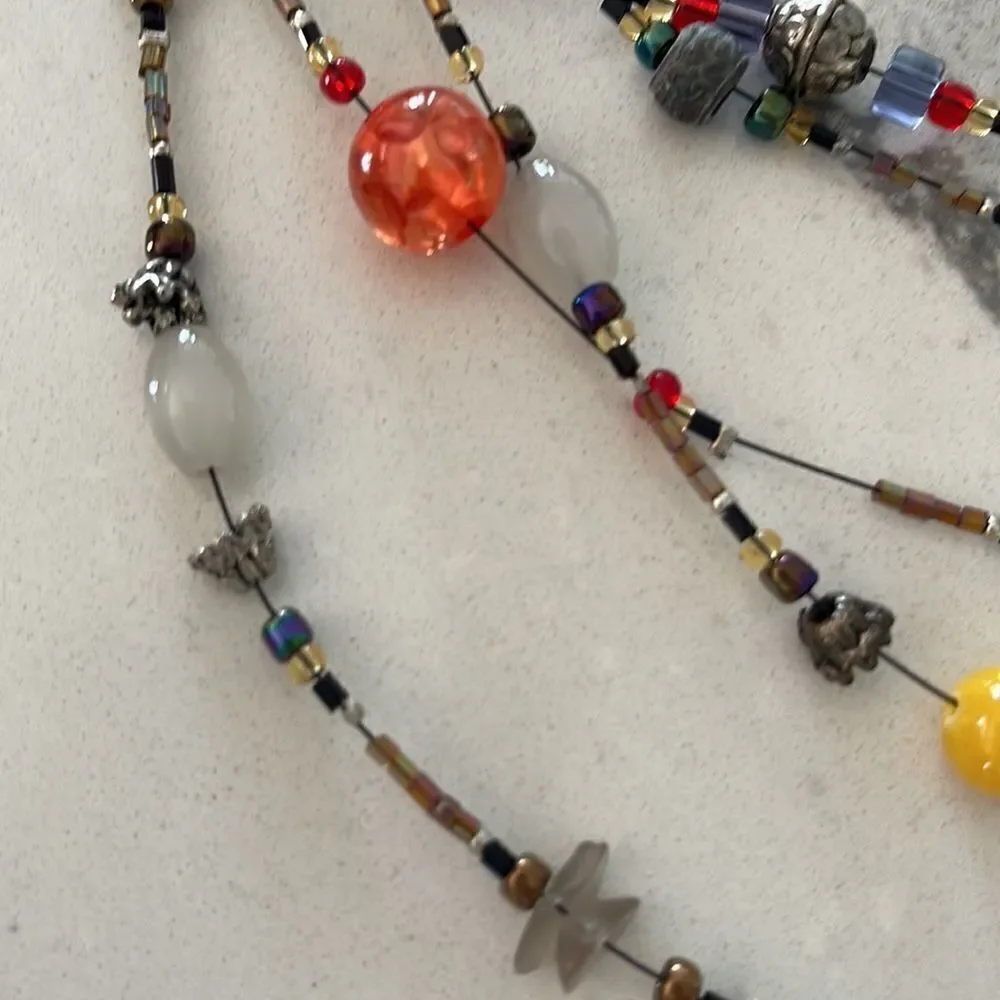 Fun multi color glass head necklace. All of the beads are glass. Art event